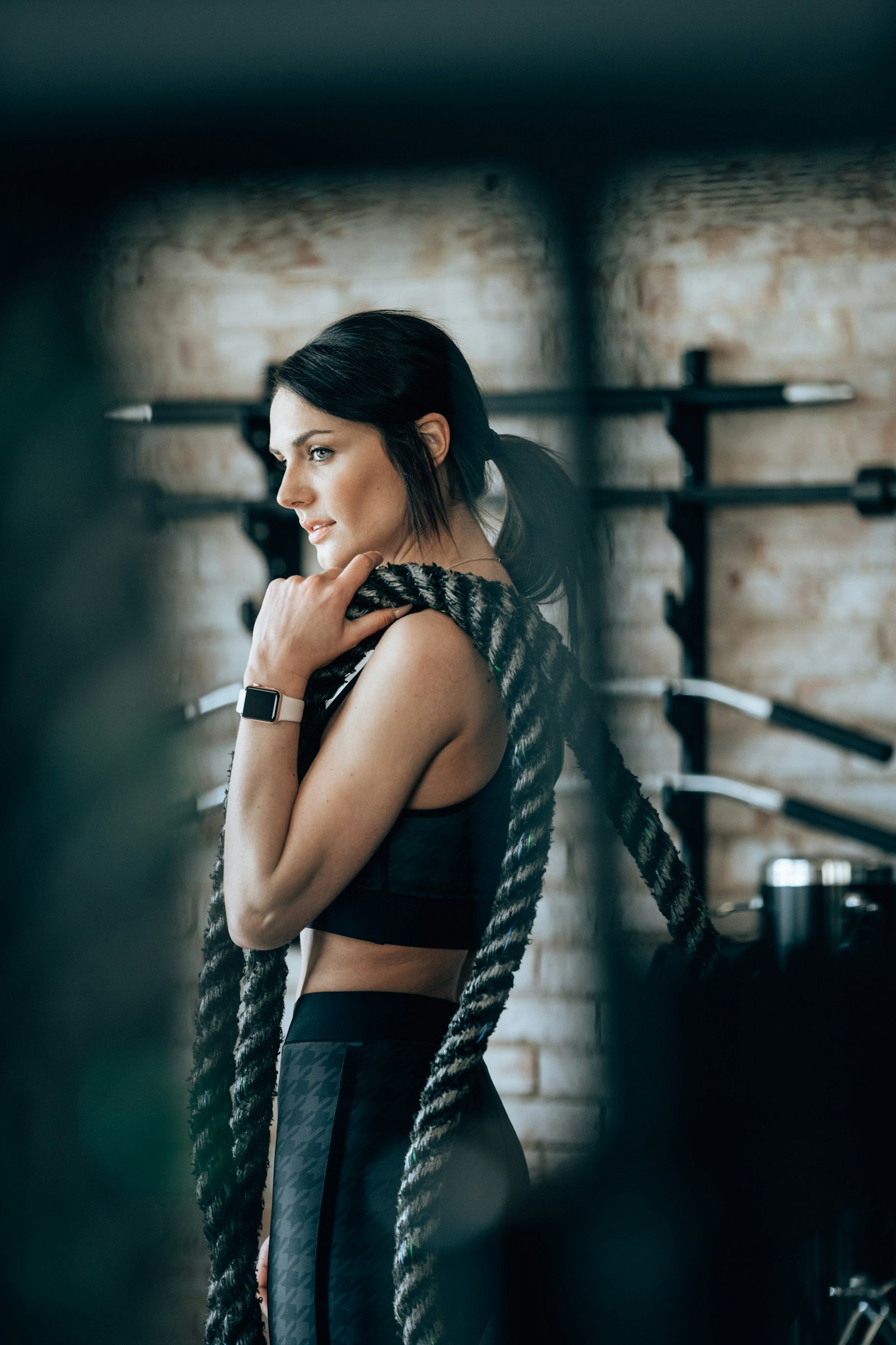 A member training with battle ropes